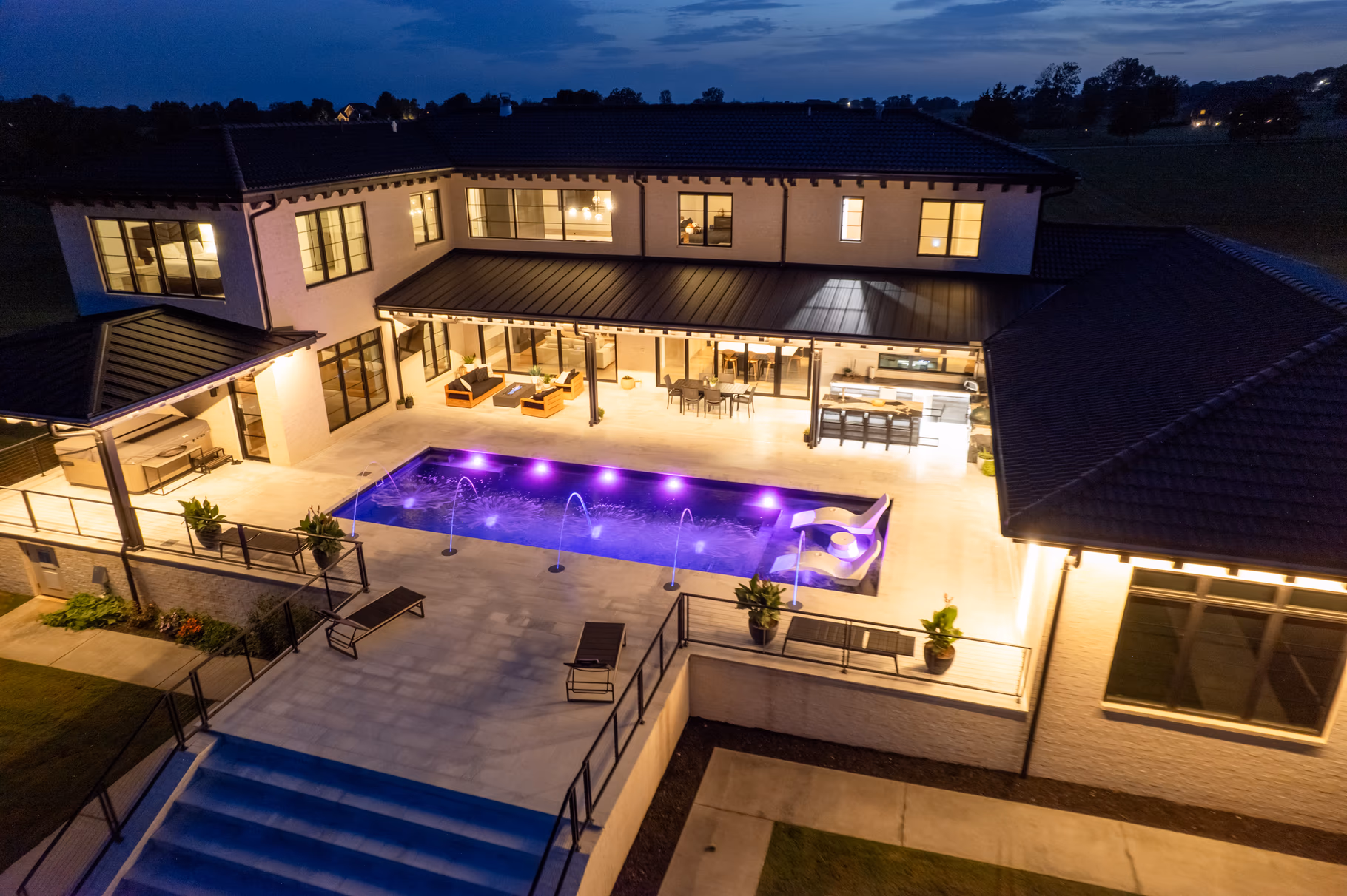 The Coyote Residence at dusk, featured in the 2026 Northwest Arkansas Parade of Homes online tour