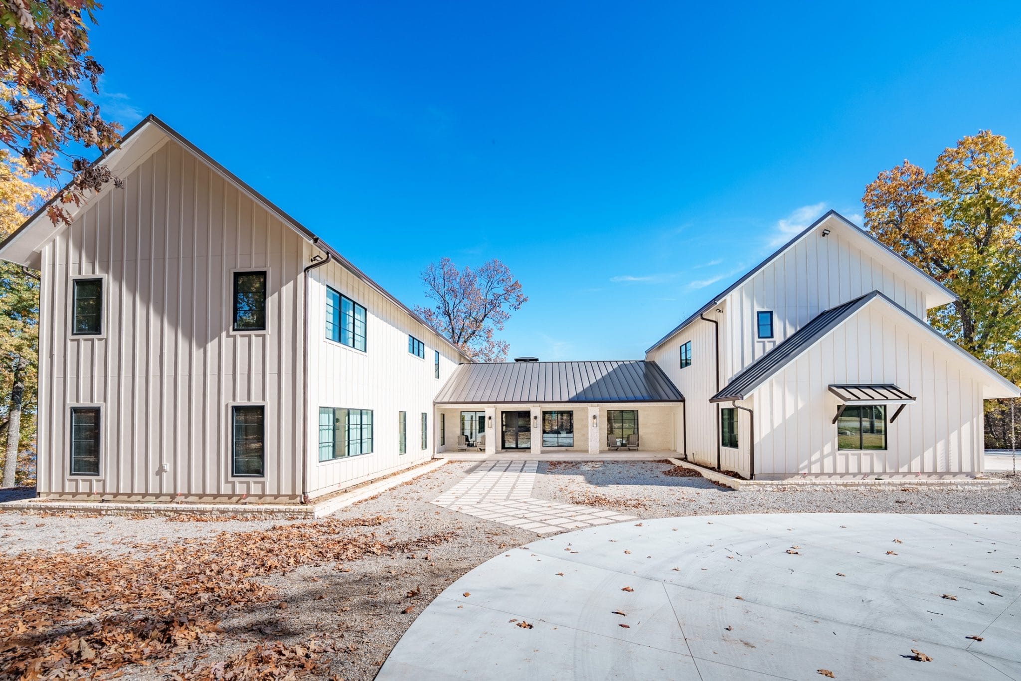 Farmhouse-style estate with connected wings