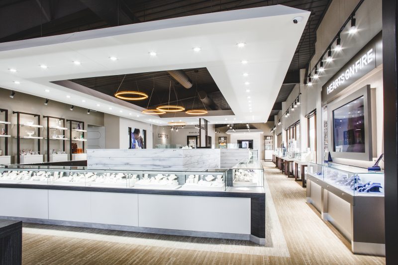 Custom commercial interior build with detailed casework and display cabinetry
